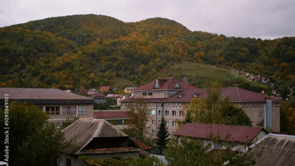 Scenic Small Town Nestled in Forested Hills with Autumn Colors Scenic Small Town Nestled in Forested Hills with Autumn Colors