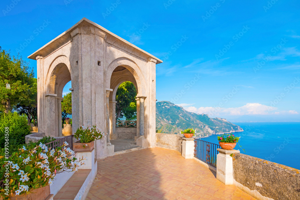The photo showcases the scenic villas of Ravello and its surroundings, set atop cliffs with panoramic views, lush gardens, and charming architecture that capture the essence of Italy’s Amalfi Coast. The photo showcases the scenic villas of Ravello and its surroundings, set atop cliffs with panoramic views, lush gardens, and charming architecture that capture the essence of Italy’s Amalfi Coast.