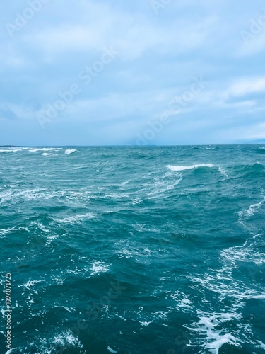 Natural seascape background, cloudy sea horizon