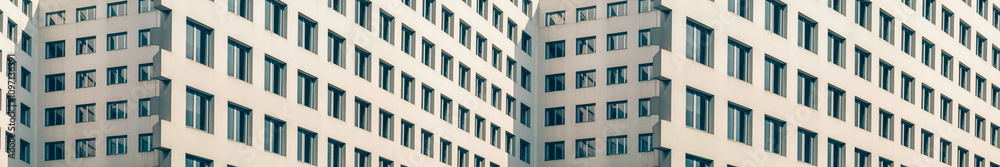 Close-up view of modern building facade with windows Close-up view of modern building facade with windows