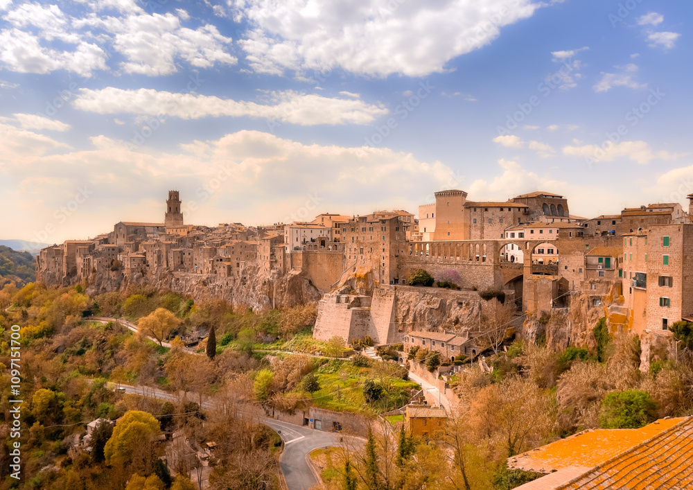 Fototapeta premium A view of the ancient town of Civita di Bagnoregio, perched atop a rocky hill in Italy