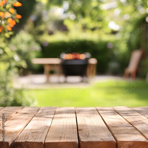 summer time in backyard garden with grill bbq wooden table blurred background