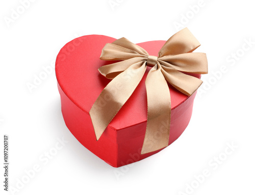 Heart shaped gift box with golden bow isolated on white