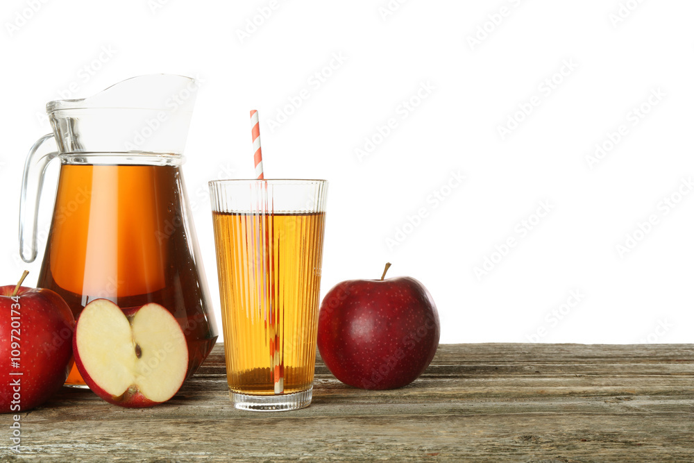 Tasty apple juice in glass, jug and fresh fruits on wooden table against white background Tasty apple juice in glass, jug and fresh fruits on wooden table against white background