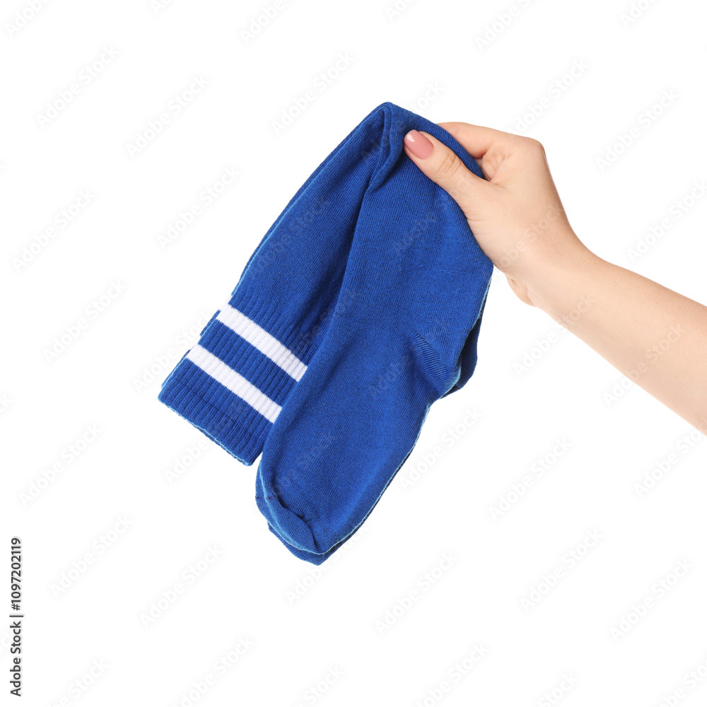 Woman holding pair of blue socks on white background, closeup Woman holding pair of blue socks on white background, closeup