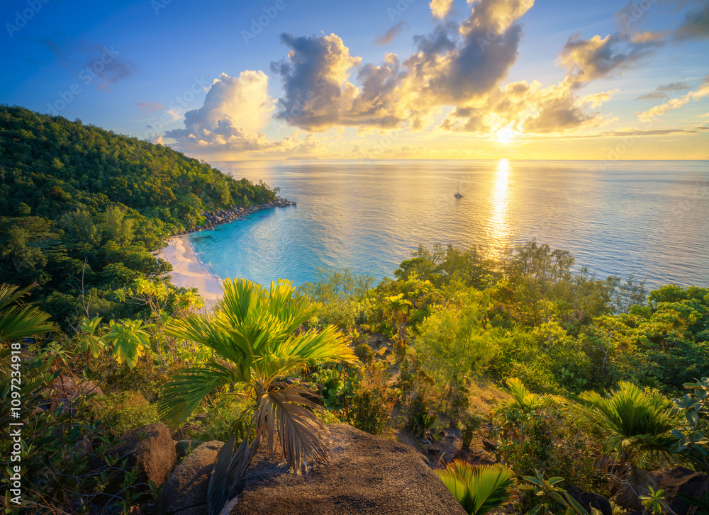 sunset at tropical beach anse georgette on praslin on the seychelles
