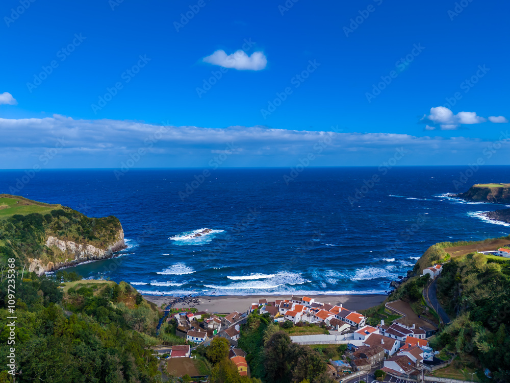 Naklejka premium Praia dos Moinhos. Aerial drone view of volcanic black sand beach in Moinhos town, Sao Miguel, Azores, Portugal. Atlantic ocean coast