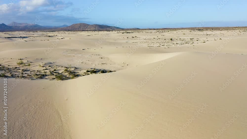Aerial view of the dunes of Corralejo Natural Park in Fuerteventura Island, Spain. Aerial view of the dunes of Corralejo Natural Park in Fuerteventura Island, Spain.