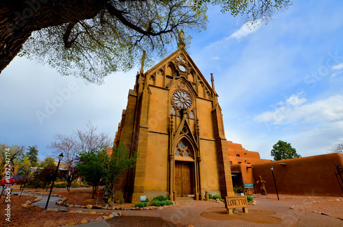 SANTA FE NM USA 04 22 2014: The Loretto Chapel in Santa Fe, New Mexico, USA is a former Roman Catholic church that is now used as a museum and wedding chapel photo