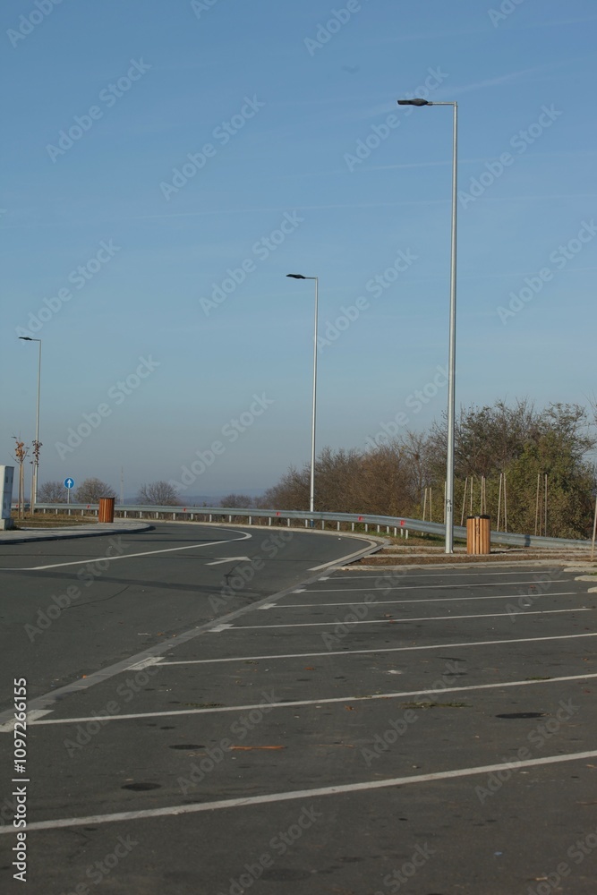 arranged and marked parking for cars and buses