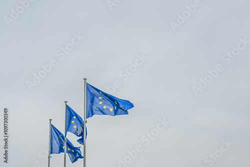 European EU flags in front of the Berlaymont building, headquarters of the European commission in Brussels, Belgium