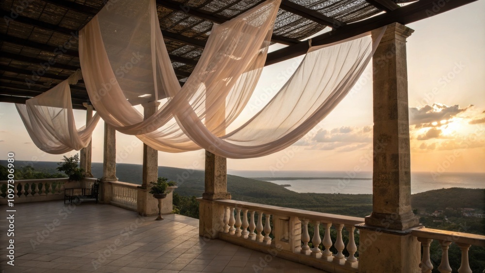 Obraz premium Softly blowing fabric drapes hung loosely from the balcony ceiling dance gently in the evening breeze creating a soothing sound reminiscent of faraway places and tranquil times.
