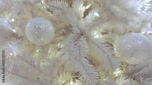 Close-up view of the decoration detail of the white Christmas tree.
