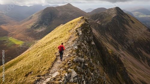 Man trail running along a mountain ridge.