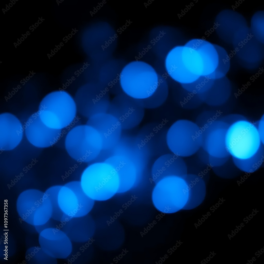 blurry Blue bokeh lights against black background in aerial view blurry Blue bokeh lights against black background in aerial view