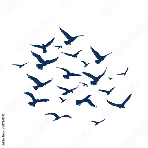 A Flock of Birds in Flight Silhouettes