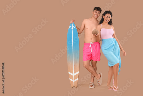 Happy young couple with sur...