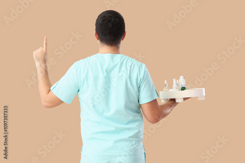 Male massage therapist with...