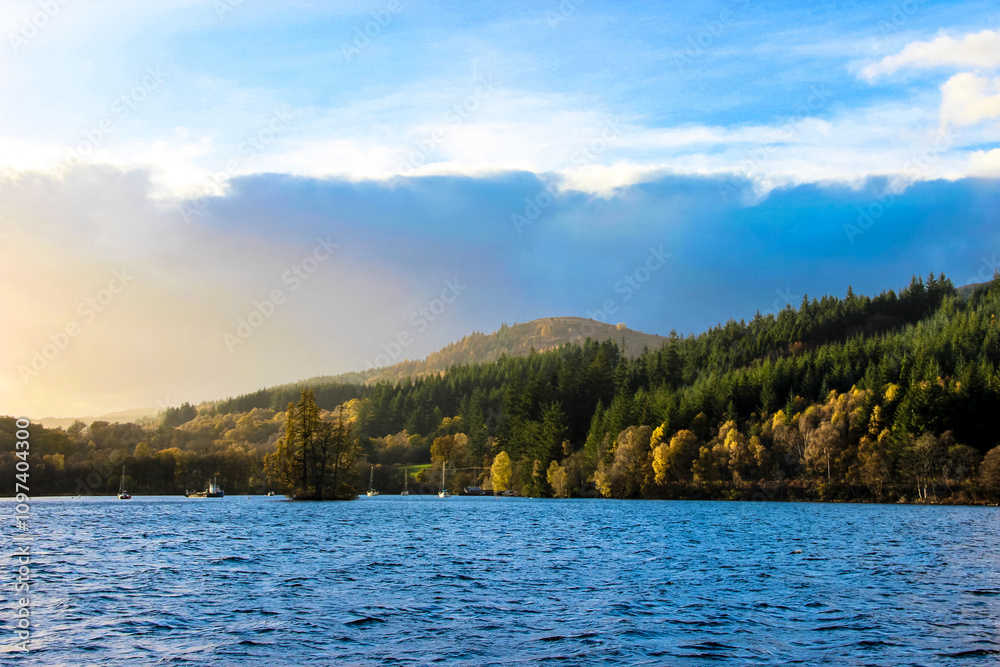 loch ness scenery in scotland, majestic lake with rolling hills in the background loch ness scenery in scotland, majestic lake with rolling hills in the background