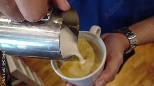 Latte art failure over a freshly brewed espresso coffee. Failure of latte art. Bad cappuccino coffee. 