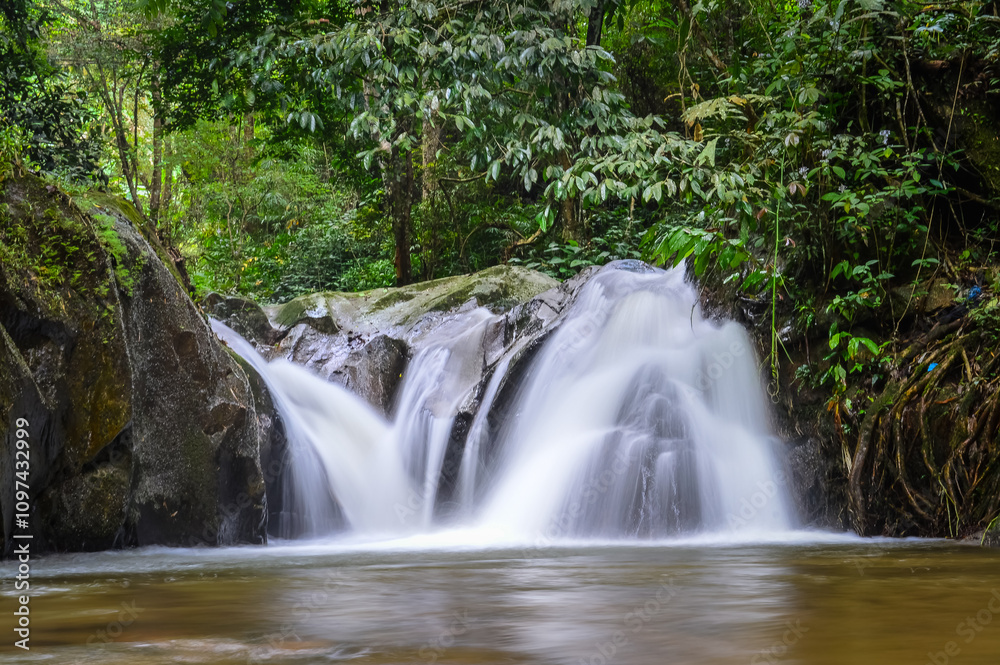 Mae wong waterfall in jungle at Doi Saket chiangmai Northern Thailand,South East Asia Mae wong waterfall in jungle at Doi Saket chiangmai Northern Thailand,South East Asia