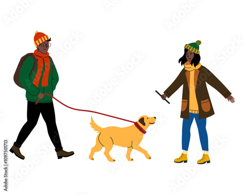 Couple enjoys walking their dog in a park during a sunny day in autumn