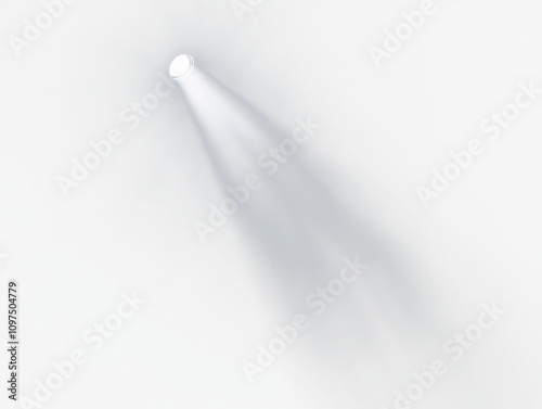 Bright spotlight beam illuminates darkness.