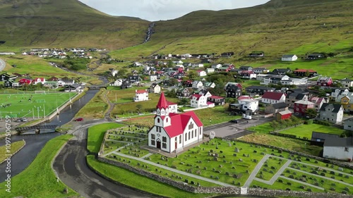 Aerial view of the beautiful church in Sandavagur, Vagar, Faroe islands photo