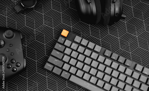 gamer work space concept, top view a gaming gear, mouse, keyboard, joystick on black table background. photo