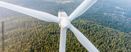 Worker testing wind turbine performance during routine check-up, green technology engineering, wind power maintenance