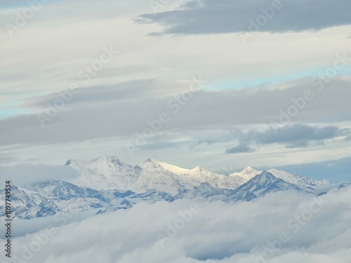 Spain, October 09, 2024: High flight in the mountains of the spanish coast. Aerial drone view to the cities, seaside and mountains. Beautiful landscape from the clouds.
