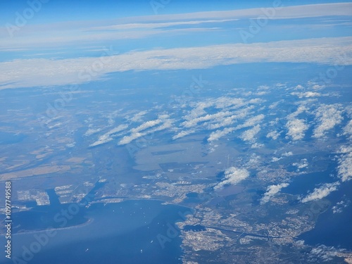 Spain, October 09, 2024: High flight in the mountains of the spanish coast. Aerial drone view to the cities, seaside and mountains. Beautiful landscape from the clouds.