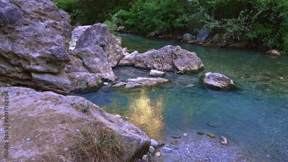 The thermal springs of Lu Vurghe flow near Acquasanta Terme on the Tronto river. Acquasanta Terme, province of Ascoli Piceno, Marche region, Italy The thermal springs of Lu Vurghe flow near Acquasanta Terme on the Tronto river. Acquasanta Terme, province of Ascoli Piceno, Marche region, Italy