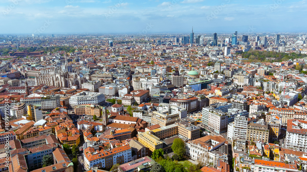 Fototapeta premium Panoramic aerial shot of Milan showcasing the juxtaposition of its rich historical landmarks and modern skyscrapers under a vibrant sky