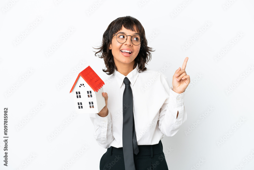 Real estate mixed race agent isolated on white background pointing up a great idea Real estate mixed race agent isolated on white background pointing up a great idea