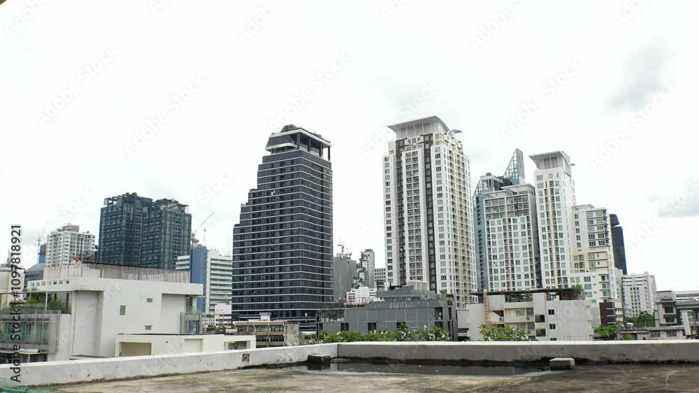 BANGKOK, THAILAND - AUGUST 2024 : View of buildings and houses at residential area. BANGKOK, THAILAND - AUGUST 2024 : View of buildings and houses at residential area.
