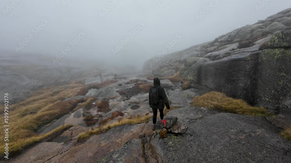 Hiker on Foggy Mountain Trail Hiker on Foggy Mountain Trail
