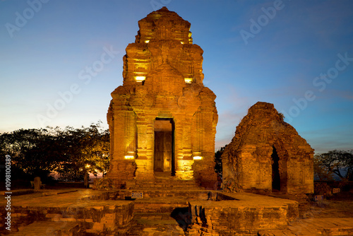 Two ancient Cham towers in night illumination. Phan thiet, Vietnam photo