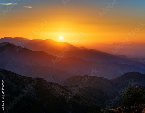 sunrising behind the san gabriel mountains in los angeles california photo taken from rocky peak park in the west san fernando valley photo