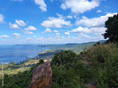 On the big stone of the view the Ubonrat dam in blue sky, Hin Chang Si View Point, Khon Kaen. photo