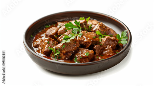 Delicious beef stroganoff served in a rustic bowl garnished with fresh parsley on a white background photo
