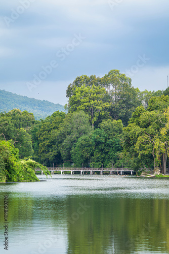 a public place leisure travel landscape lake views at Ang Kaew Chiang Mai University and Doi Suthep nature forest Mountain views spring cloudy sky background with white cloud. photo