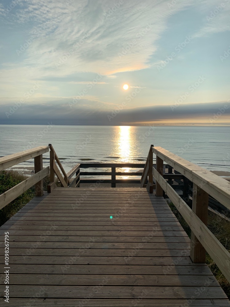 Fototapeta premium wooden pier at sunset