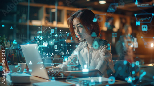Innovative Workday: Asian Woman Project Manager Engaged with Computer, Virtual Tools. Exploring New Technologies Through Digital Interfaces and Futuristic Icons. Technology, Business, Modern Workplace