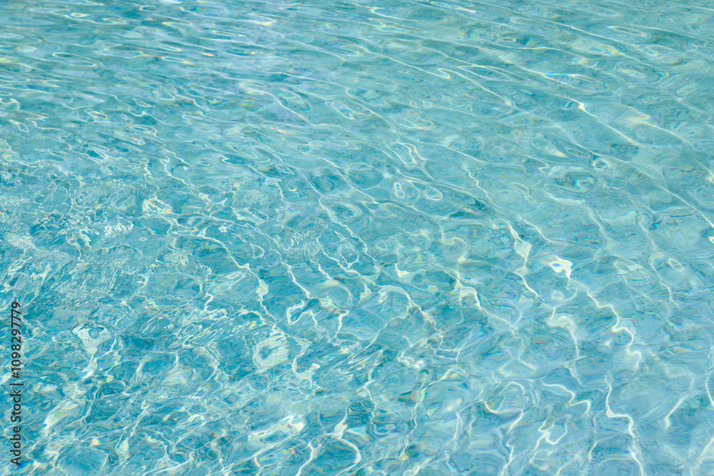 Obraz premium abstract blue color water wave in swimming pool pure natural swirl pattern texture