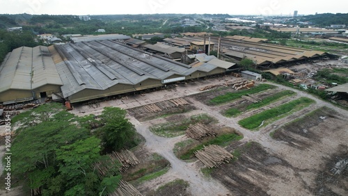 Bintulu, Malaysia - November 23, 2024: The Factories of Jepak Industrial Estate along Kemena River photo