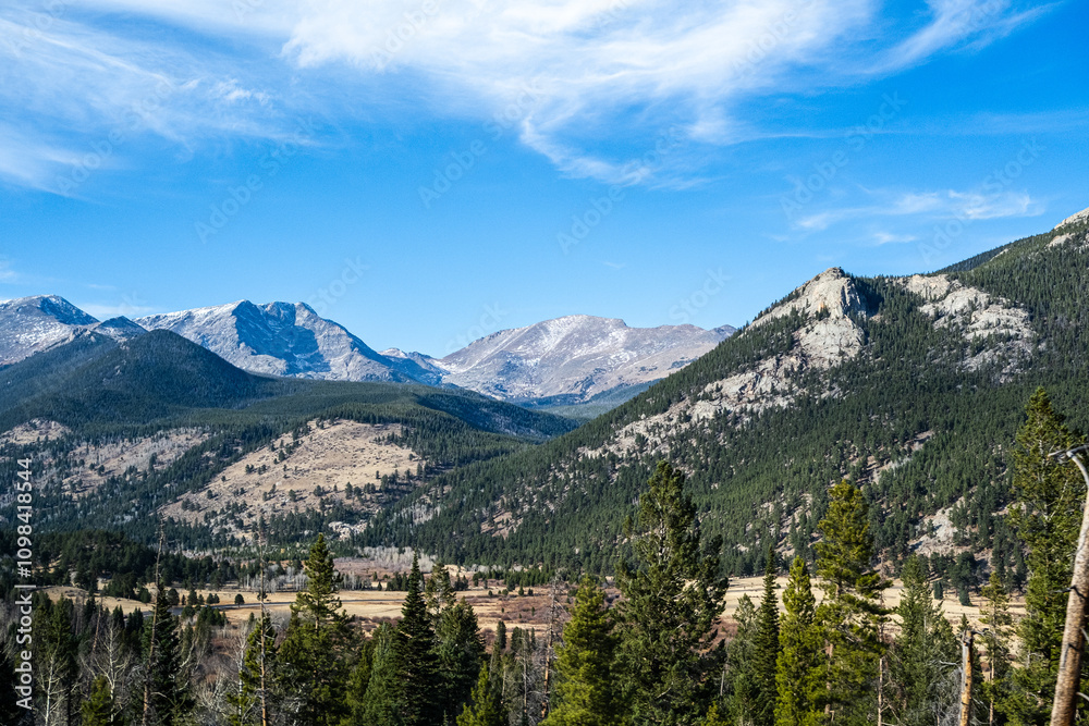 Obraz premium The Rocky Mountain National Park, Colorado , USA in November with smoke rising from controlled fires