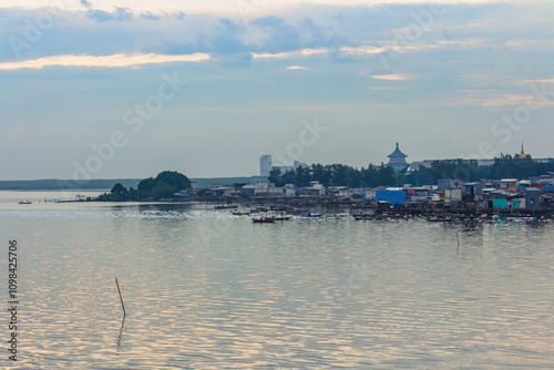 Panorama Sunrise Coast with Cloudy Skies at Kenjeran Beach, Indonesia.
 photo