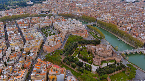 Amazing aerial shot of Castel Sant’Angelo with the Tiber River, surrounded by Rome’s historic urban beauty