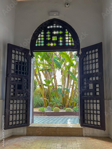 Wooden doors agains white-washed homes in Morocco photo